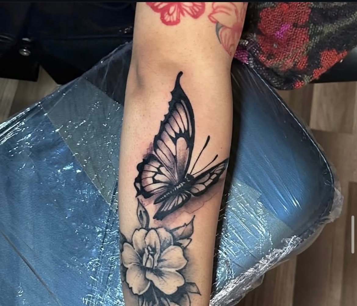 Black and grey tattoo by Flash